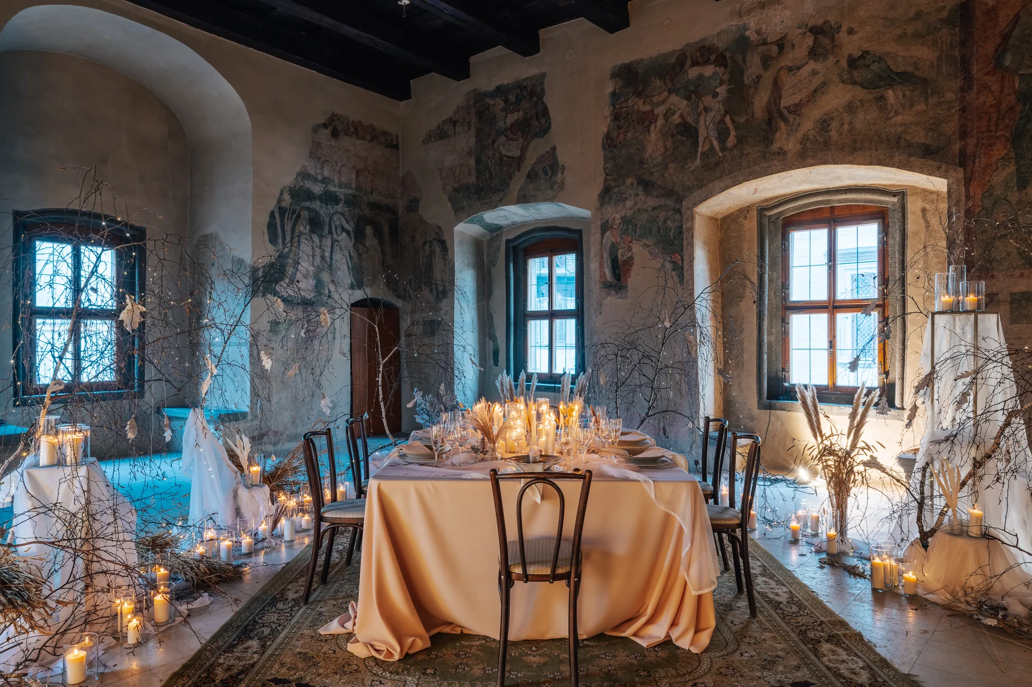 Set tables in the Fresco Hall